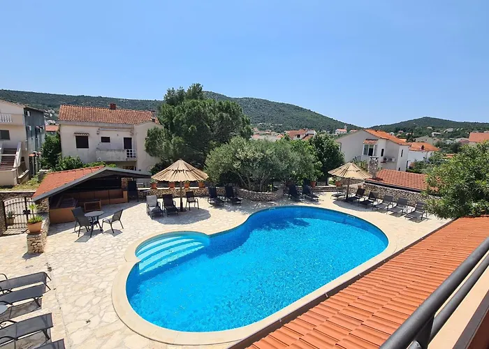 Red House Apartment With Swimming Pool